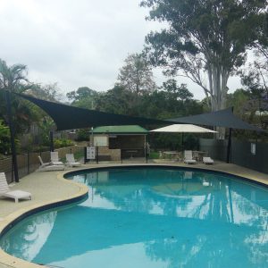 Shade sail over pool